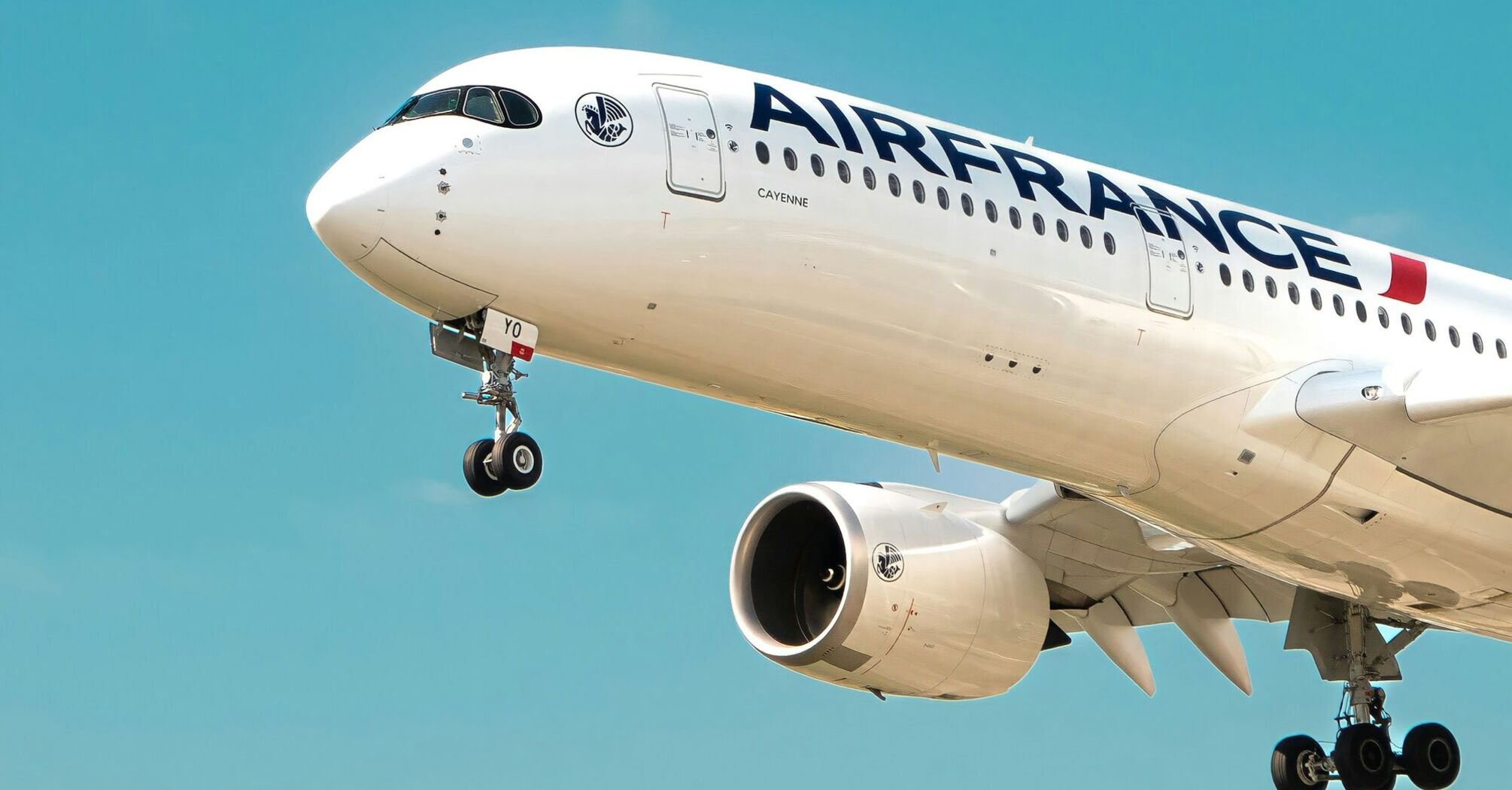 Air France airplane in flight with landing gear down