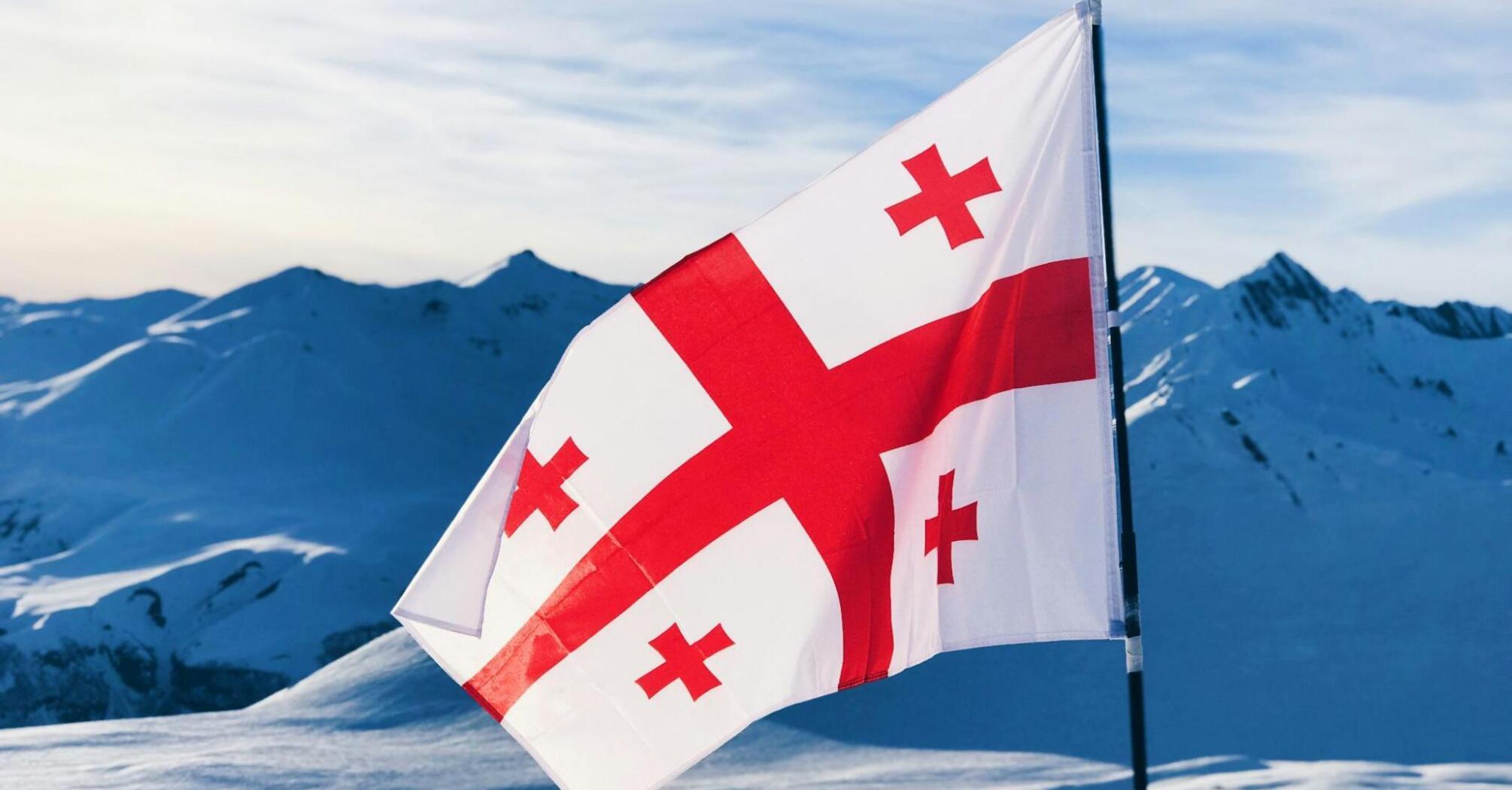 Georgian flag in the mountains