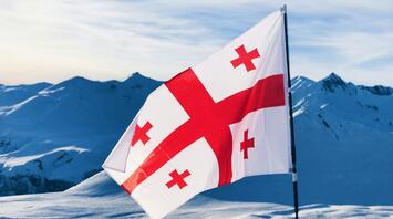 Georgian flag in the mountains