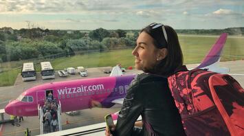 Woman waiting for boarding on Wizz Air flight