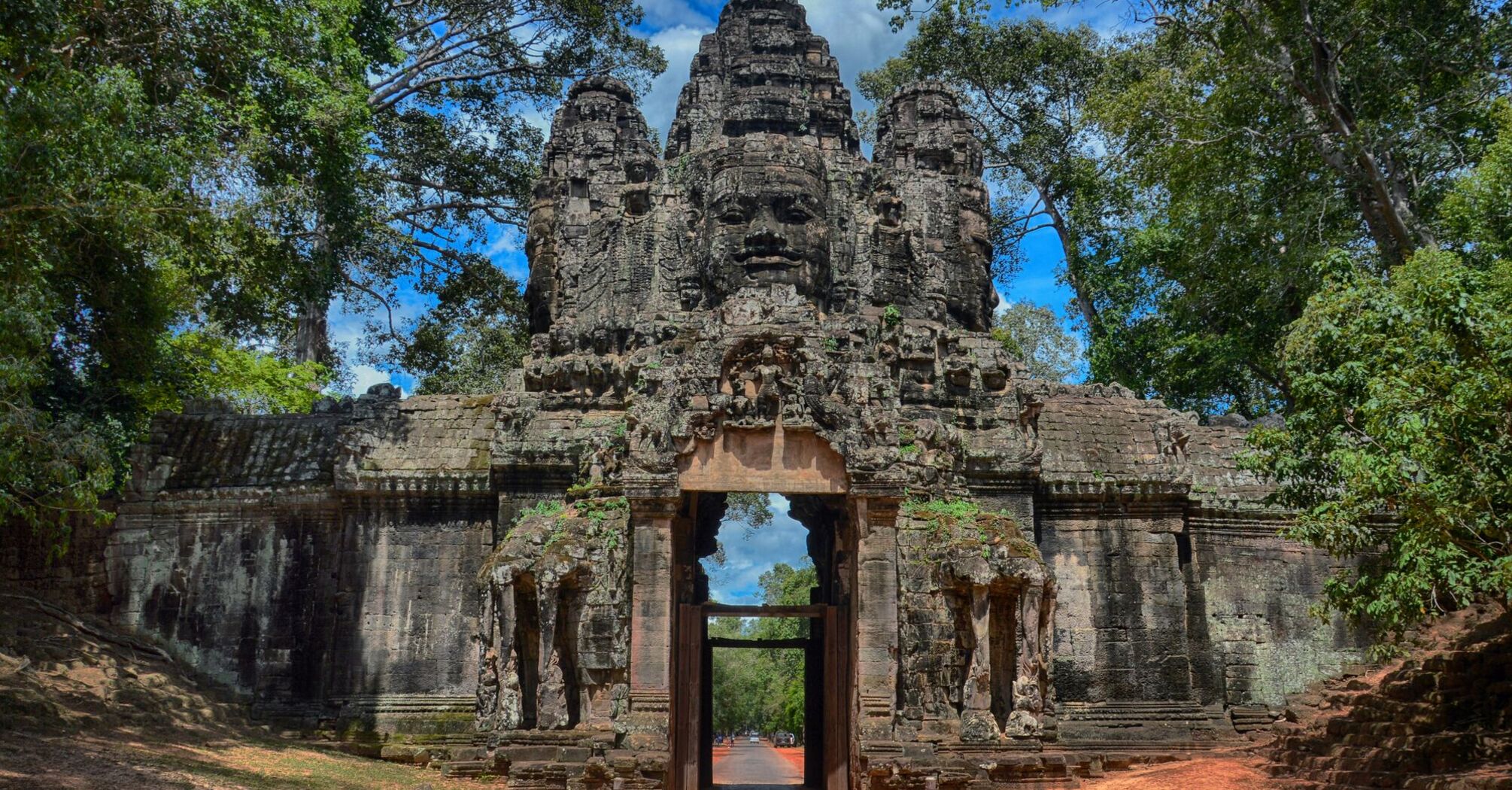 the entrance to an ancient Angkor Wat temple in the jungle