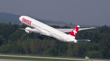 SWISS airplane taking off from the runway