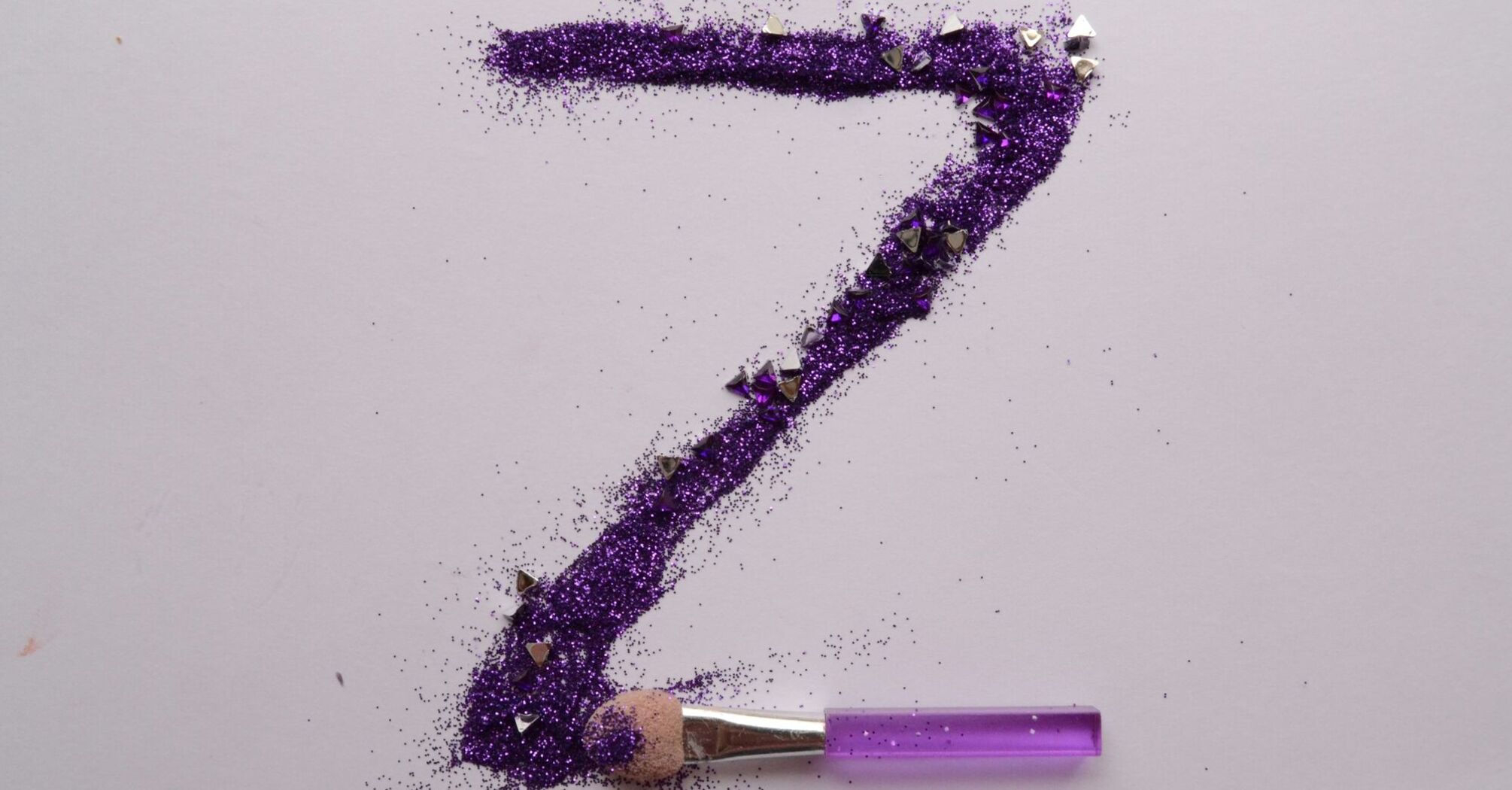 purple and white stick with white background