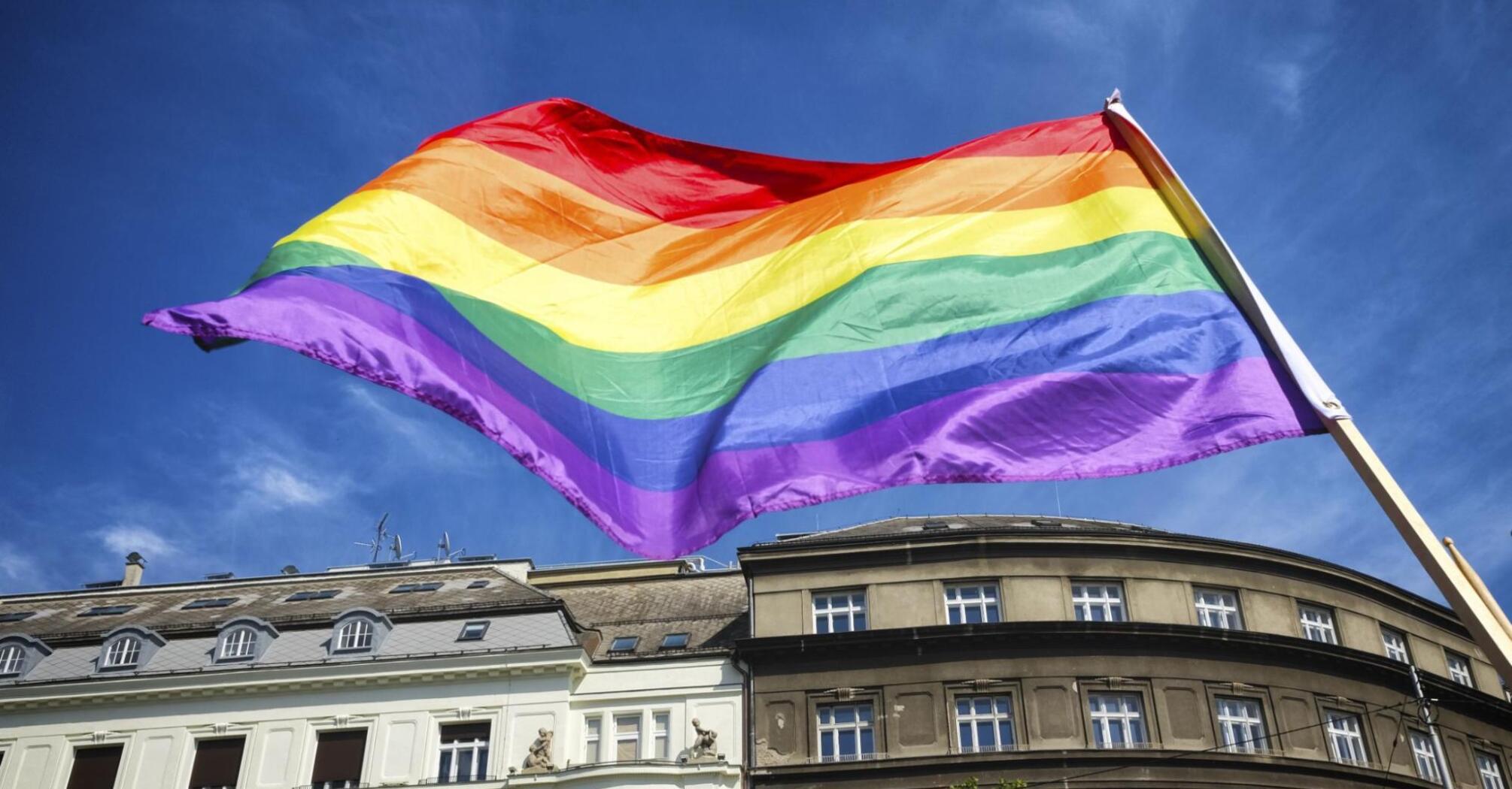 Rainbow flag among the city