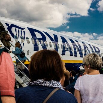 passengers entering a Ryanair aeroplane