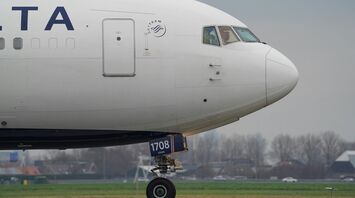 White passenger plane on airport during daytime