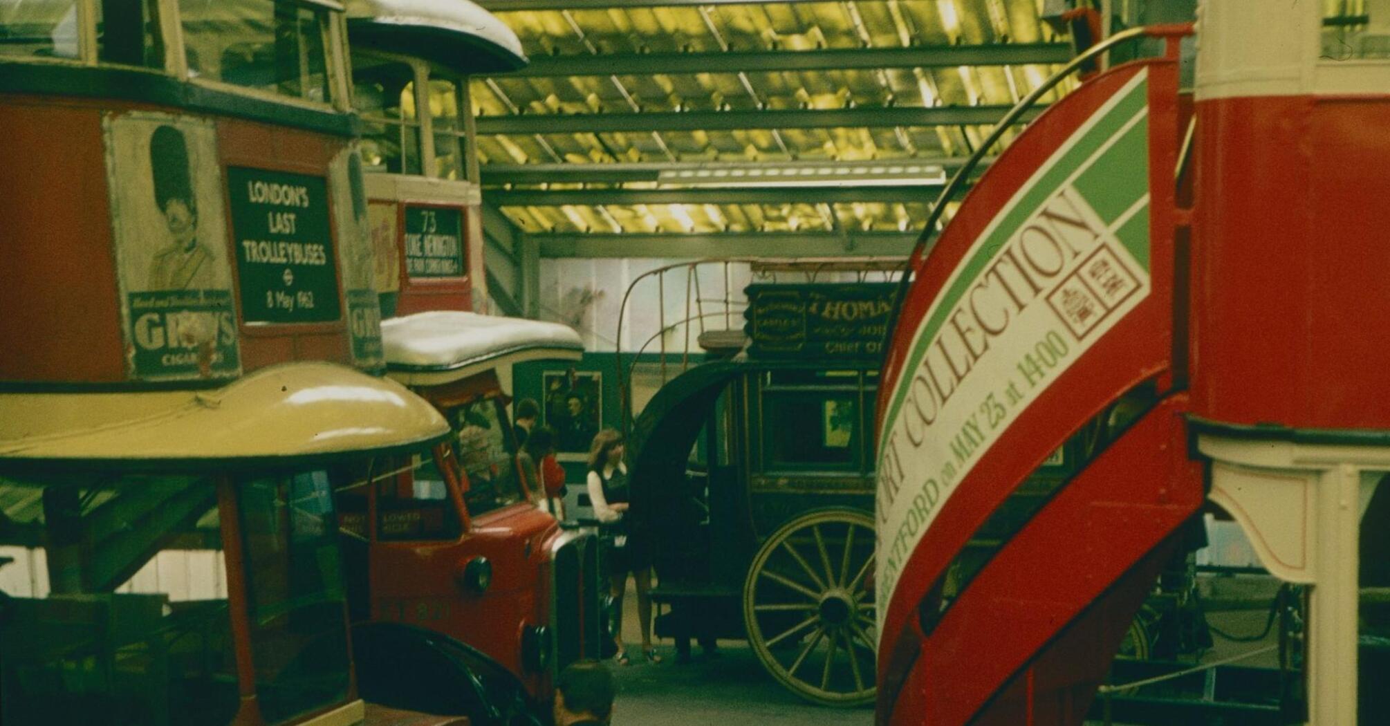 Vintage buses on display in a transport museum