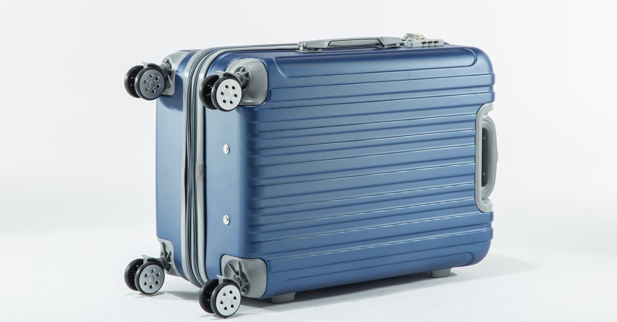 Blue suitcase lying on its side