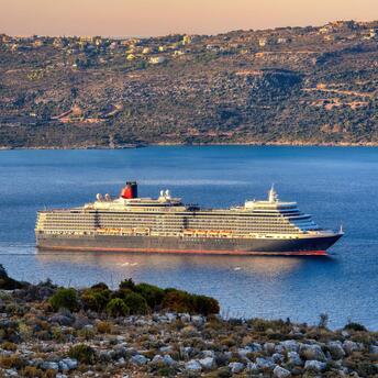 Liner sails near the mountain coast