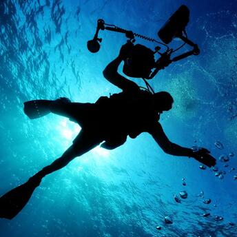Diver in the depths of the sea