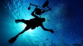 Diver in the depths of the sea
