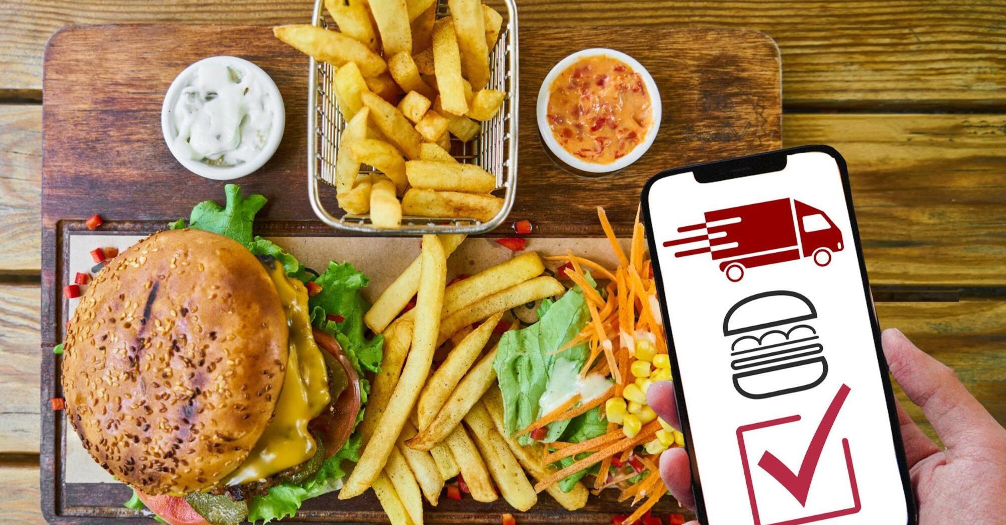 Burger and fries with a delivery call