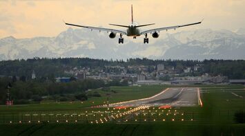 White biplane on landing