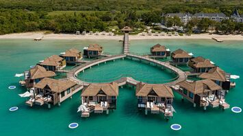 Overwater bungalows at Jamaica's Sandals South Coast: a dream resort for romantic getaways and special moments