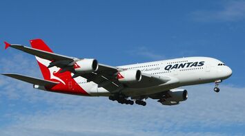 Qantas plane flying in the sky