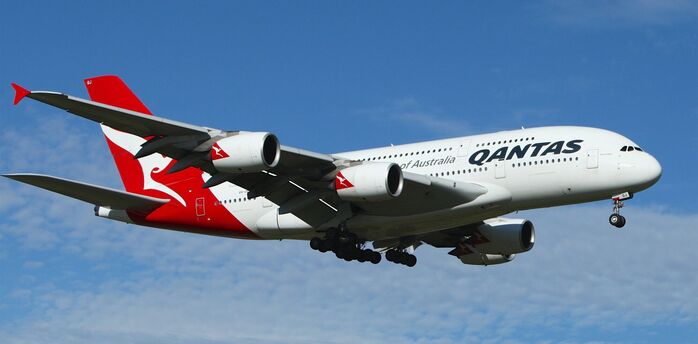Qantas plane flying in the sky