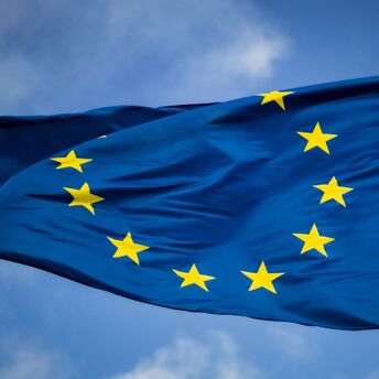 European Union flag waving against a clear sky