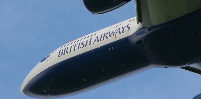 Close-up of British Airways logo on the underside of an airplane engine