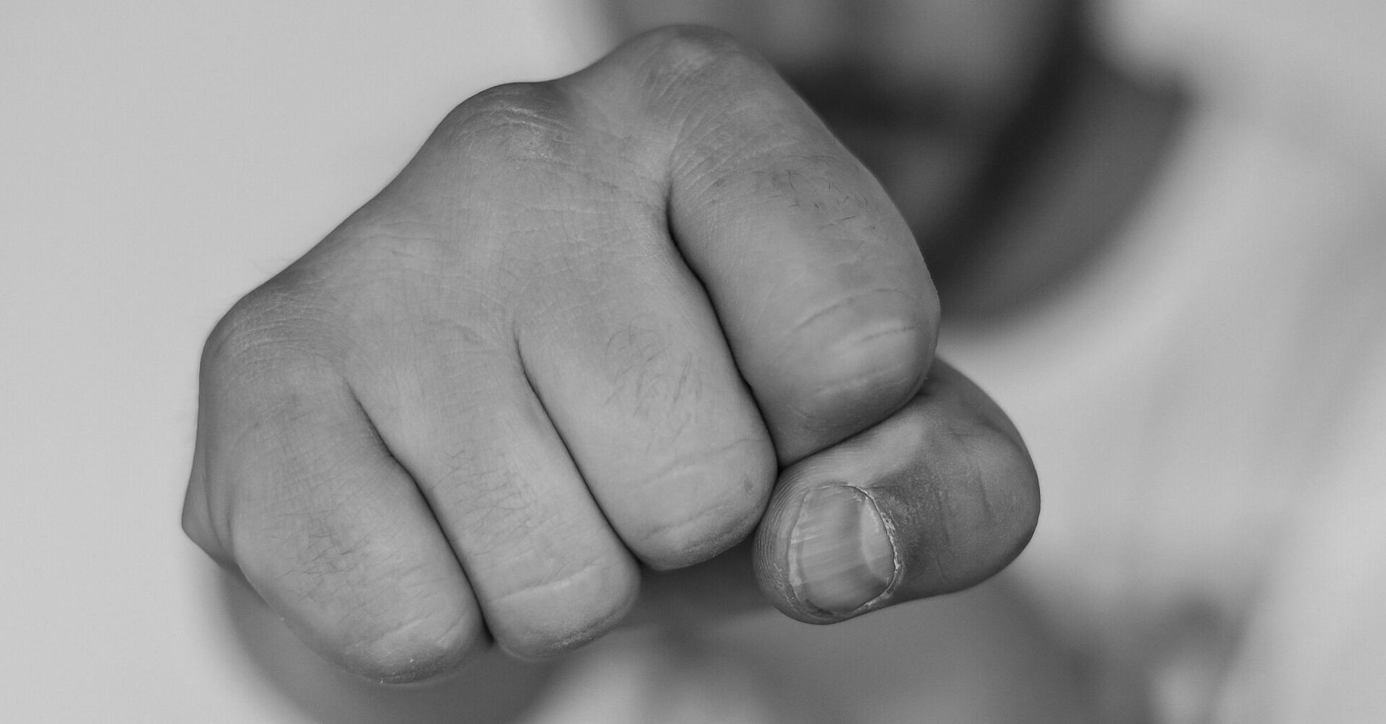 Close-up of a clenched fist in black and white