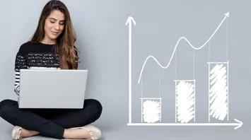 Girl with a notebook and graphs