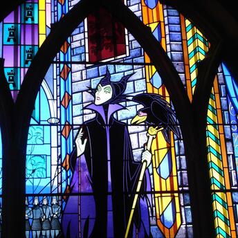 The evil stepmother with the raven from the famous fairy tale