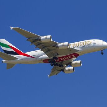 Emirates plane flying in the sky