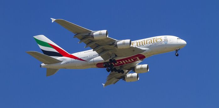 Emirates plane flying in the sky