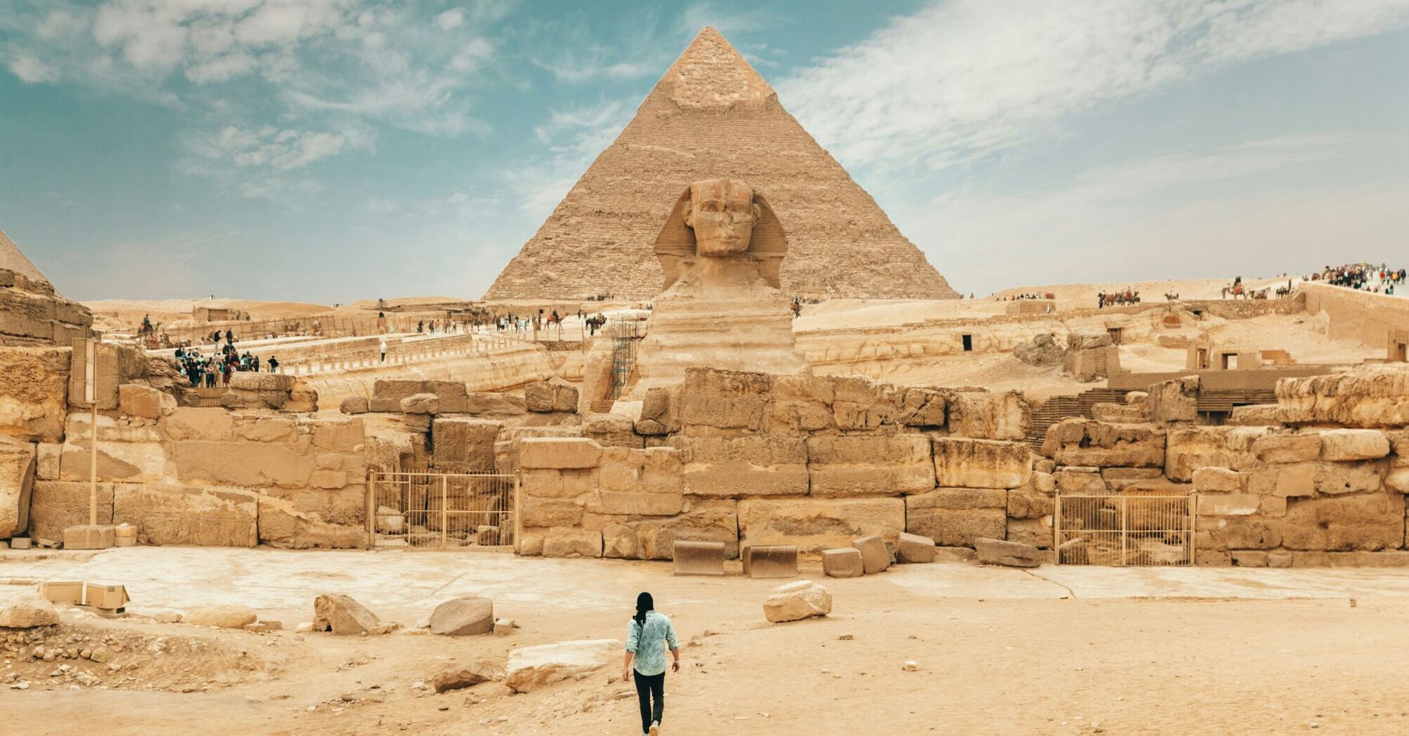 Person walking near the great sphinx