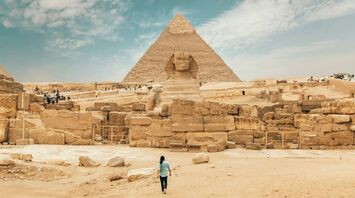 Person walking near the great sphinx