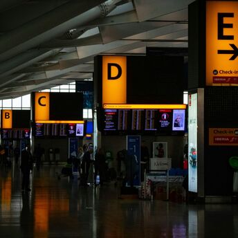 Interior view of a busy Heathrow airport terminal