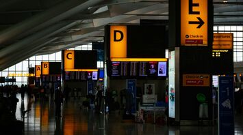 Interior view of a busy Heathrow airport terminal