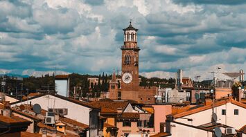An aerial tapestry of history, where spires and modern structures mingle over a city rich in heritage and tales untold.