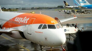 easyJet airplane at an airport gate