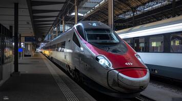 A modern high-speed train at the railway station, ready for departure