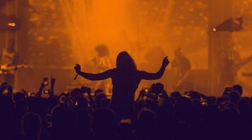 A crowd enjoying a live music performance at a festival