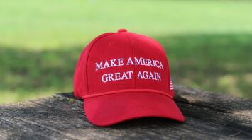 MAGA hat on a wooden surface