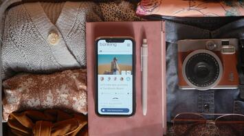 An open suitcase with different items