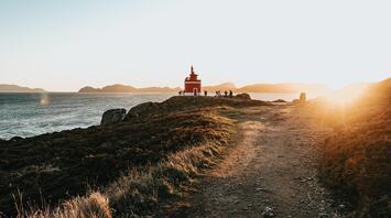 Scenic coastal trail at sunset