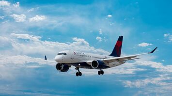 Delta airplane flying in the sky