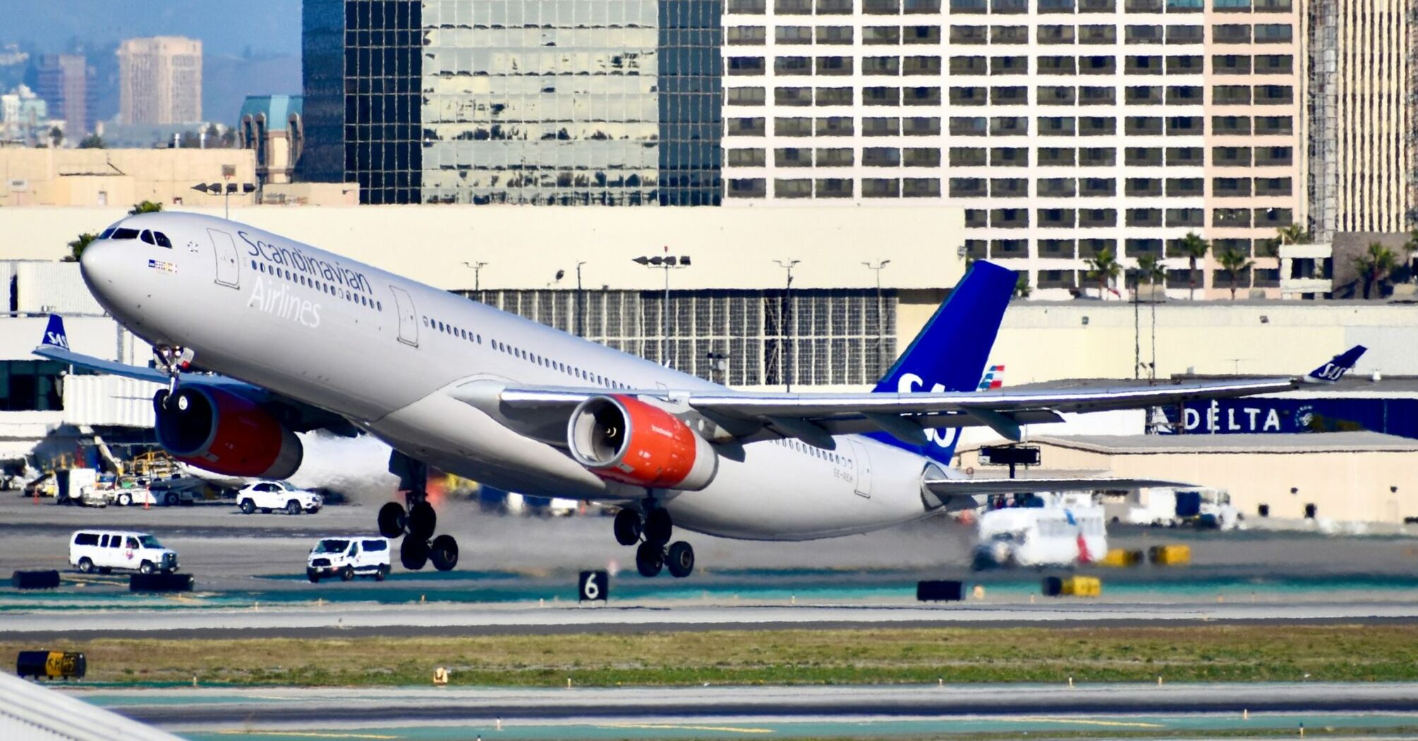SAS airplane taking off from airport