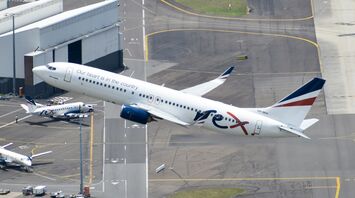 Rex 737-800 departing Sydney Airport