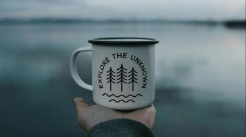 The cup in the hand of traveler