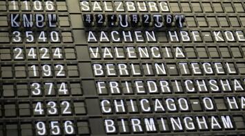 Electronic train schedule board at a European station