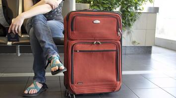 Woman with the suitcase in Airport