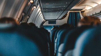 Interior of an airplane with rows of seats