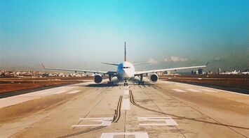 Airplane on runway preparing for takeoff