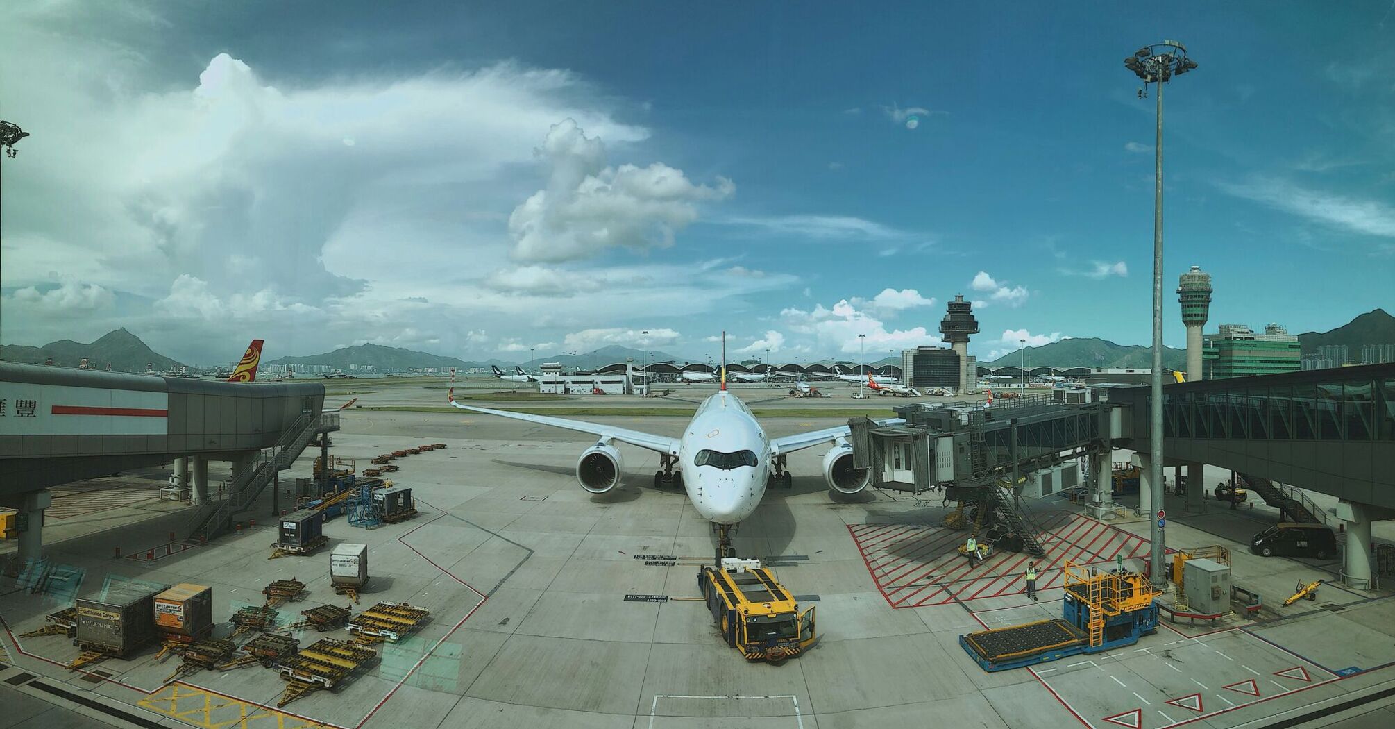 scenery of white airplane landed on Hong Kong airport