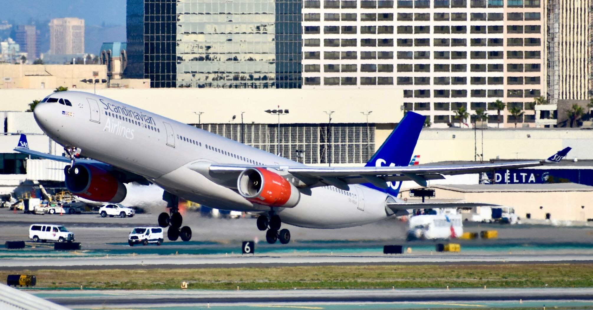 SAS airplane taking off from an airport