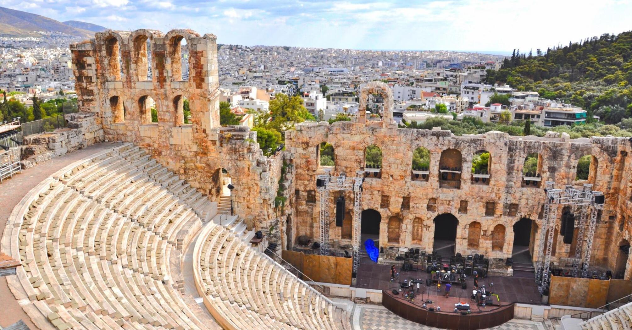 View of the ancient amphitheater with the modern city in the background