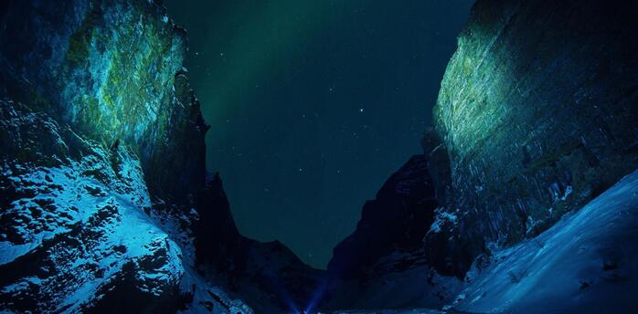 Auroras bursting down the canyon at midnight